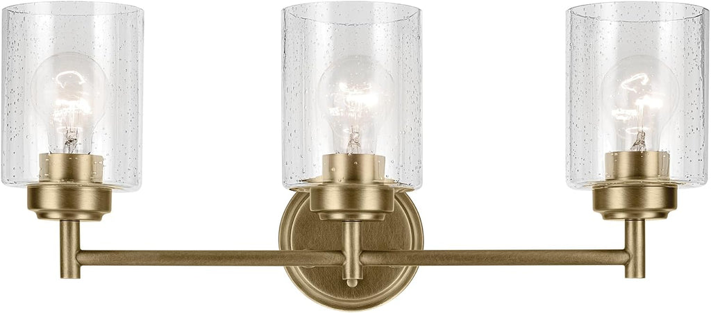 Kichler Winslow 21.5' 3-Light Bathroom Vanity Light Fixture with Clear Seeded Glass in Natural Brass for Luxe Industrial Style Over Mirror (21.5' x 9.25'), 45886NBR