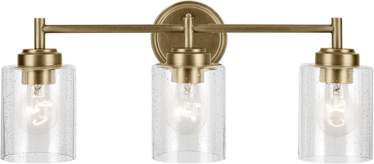 Kichler Winslow 21.5' 3-Light Bathroom Vanity Light Fixture with Clear Seeded Glass in Natural Brass for Luxe Industrial Style Over Mirror (21.5' x 9.25'), 45886NBR